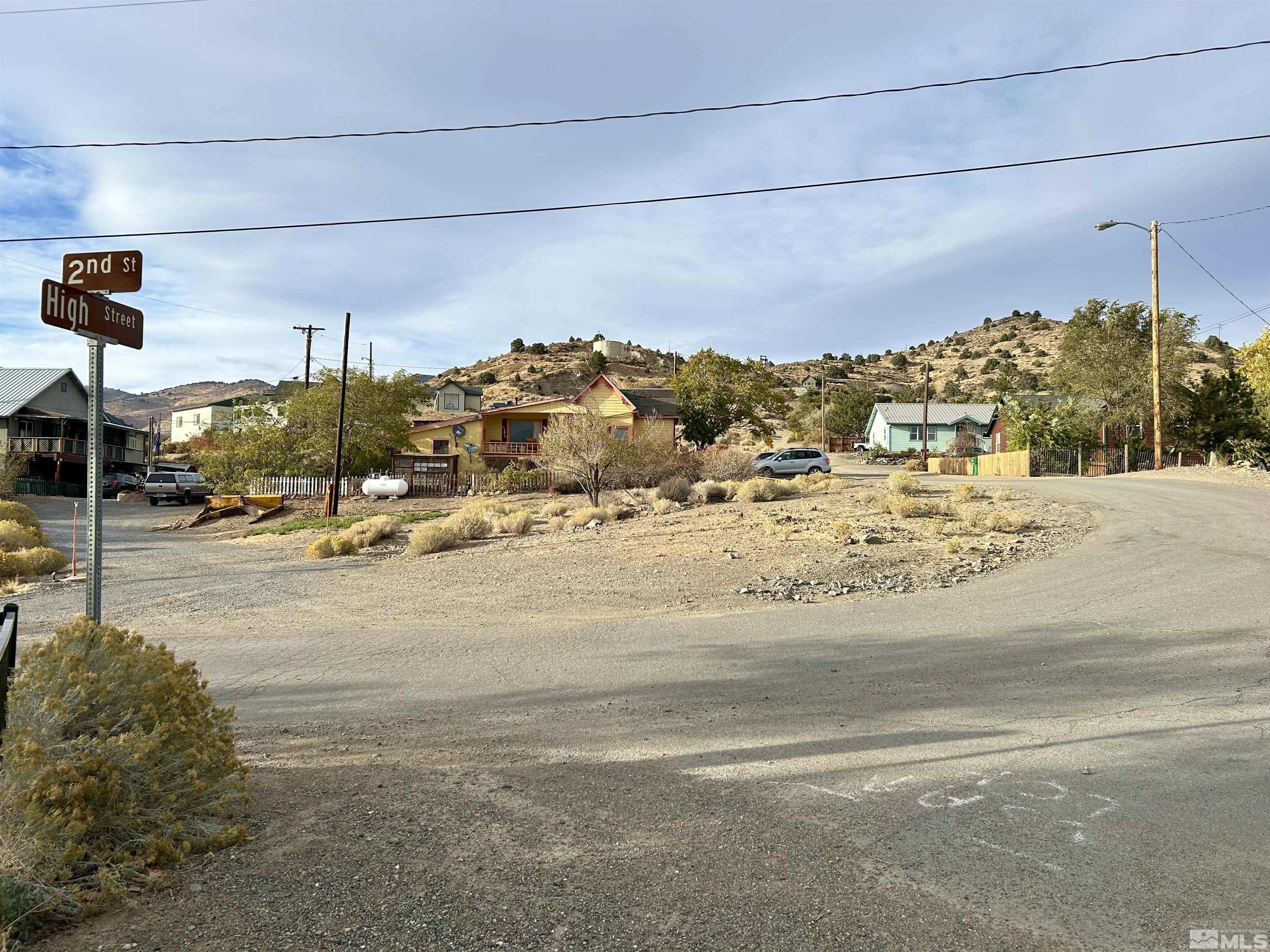 a view of a road with a building in the background