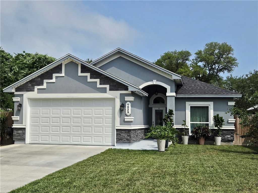 a front view of house with yard