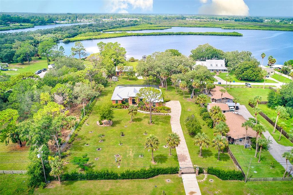 a view of a lake with a yard