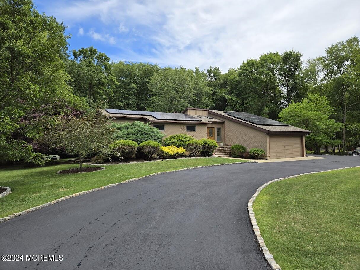 a view of a house with a big yard