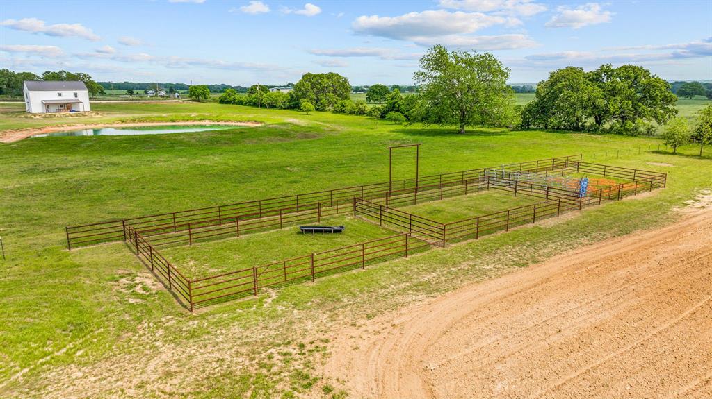 a view of an outdoor space and tennis court