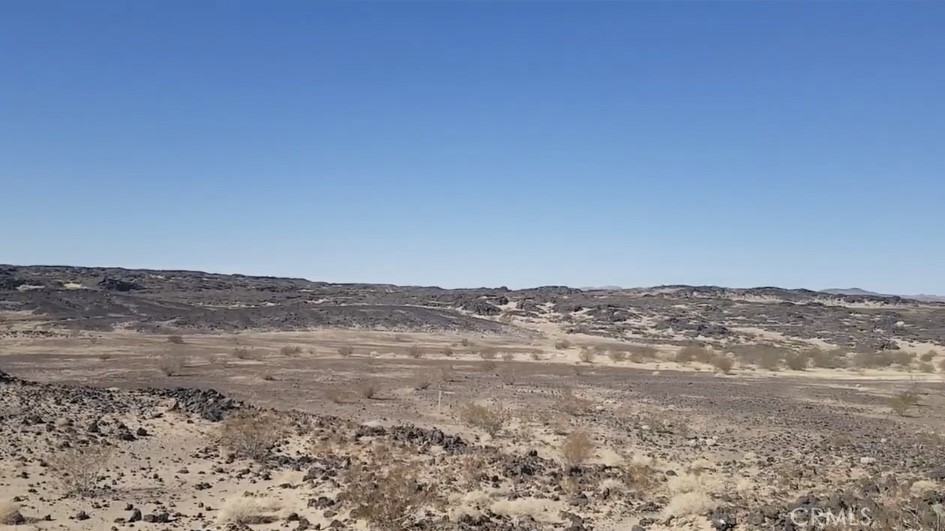 a view of ocean and mountain