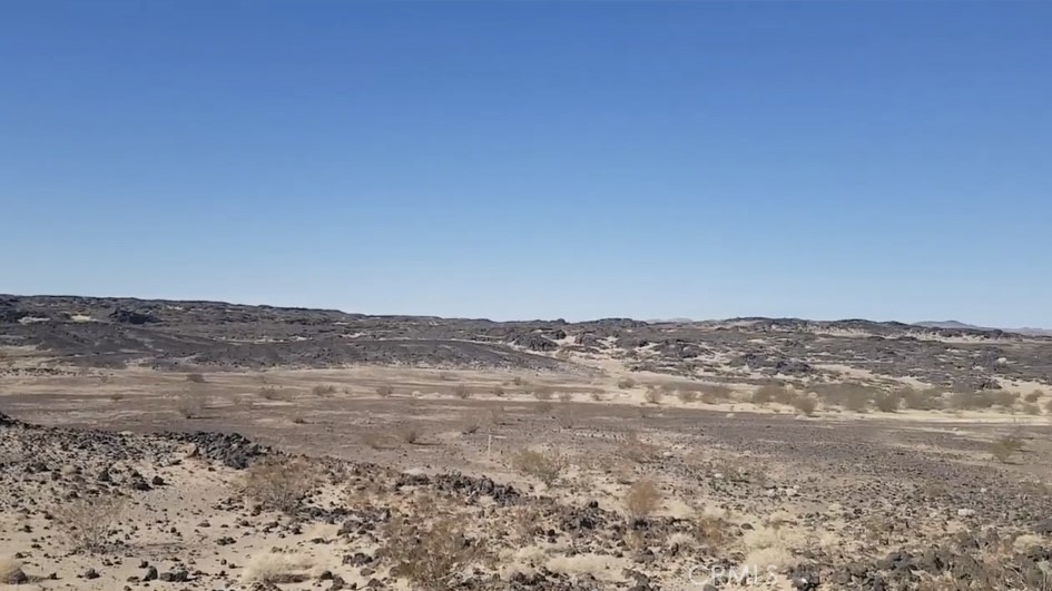 a view of ocean and mountain