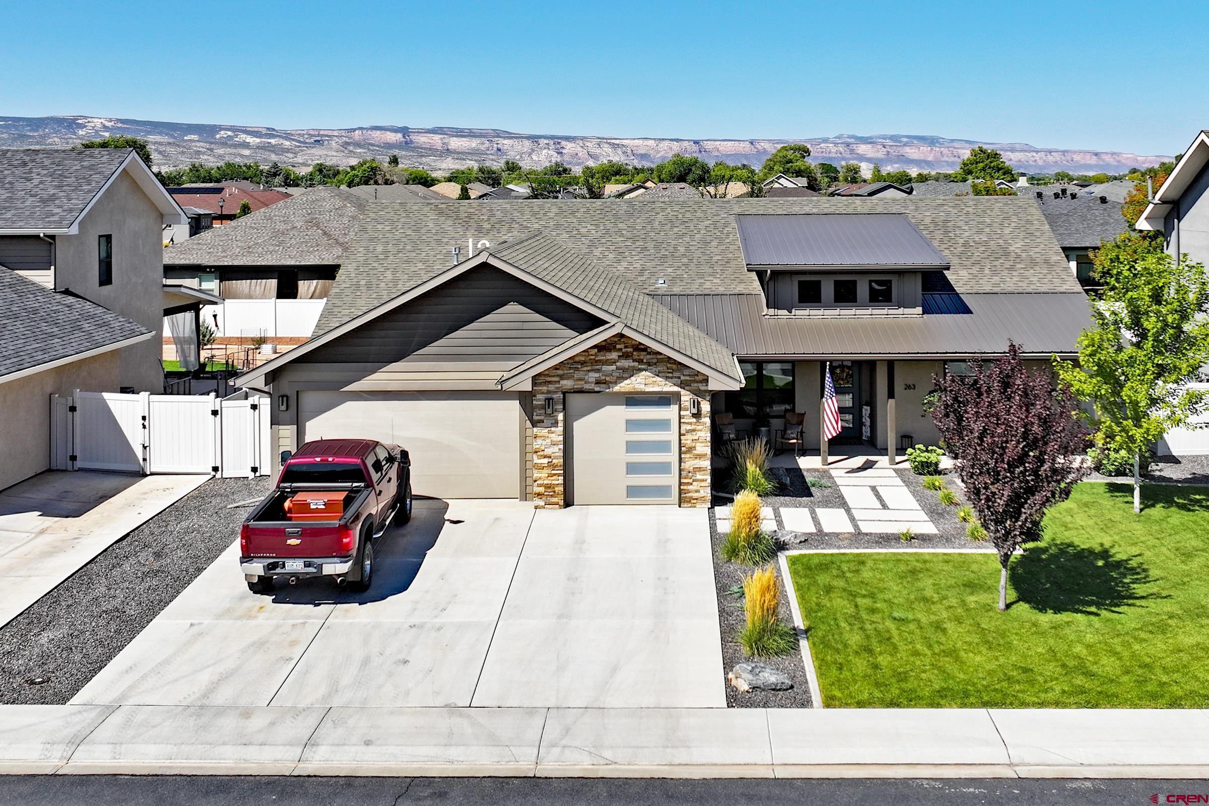 an aerial view of a house with garden