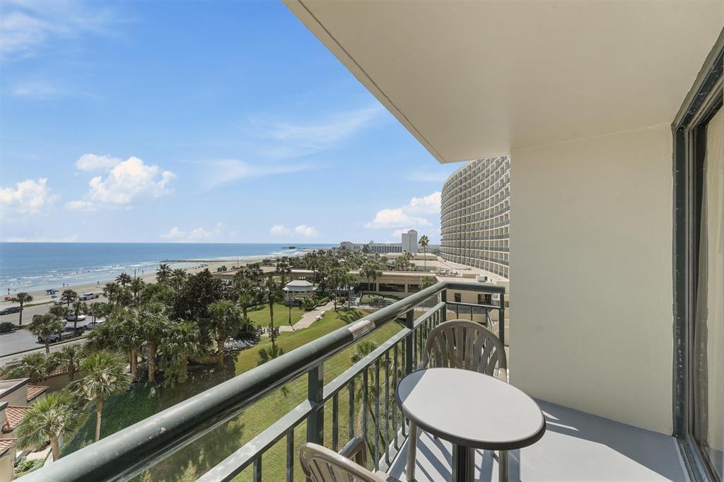 From this 7th-floor balcony at San Luis, take in stunning panoramic views of the Gulf of Mexico and the beautifully landscaped grounds below. It's the perfect spot to start your day with a cup of coffee or unwind in the evening as the sun sets over the water.