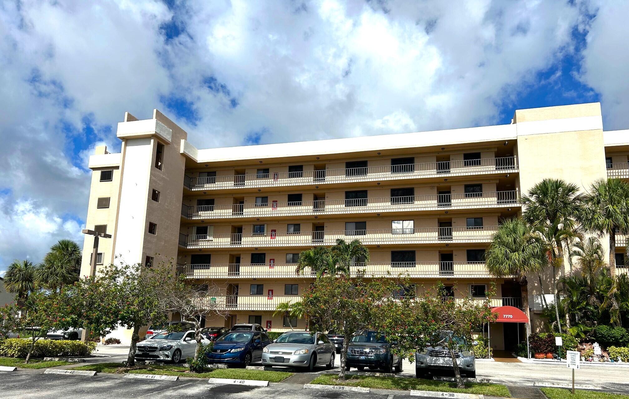 a front view of a building with street view