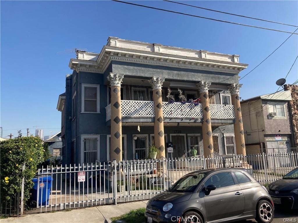 a front view of a house with a balcony