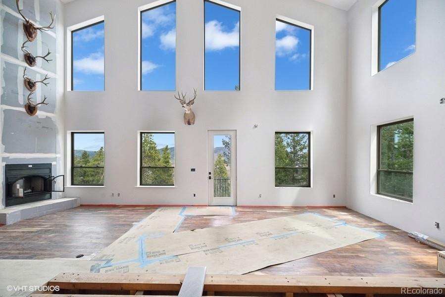 a view of livingroom with furniture and window