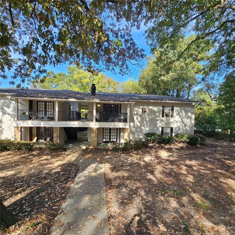 front view of a house with a big yard