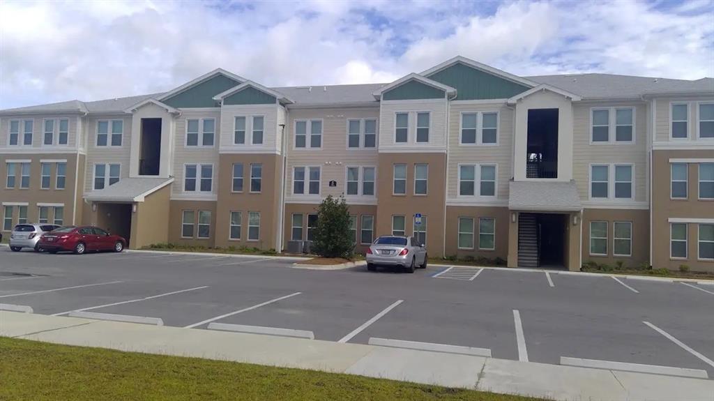 a view of a building with a street