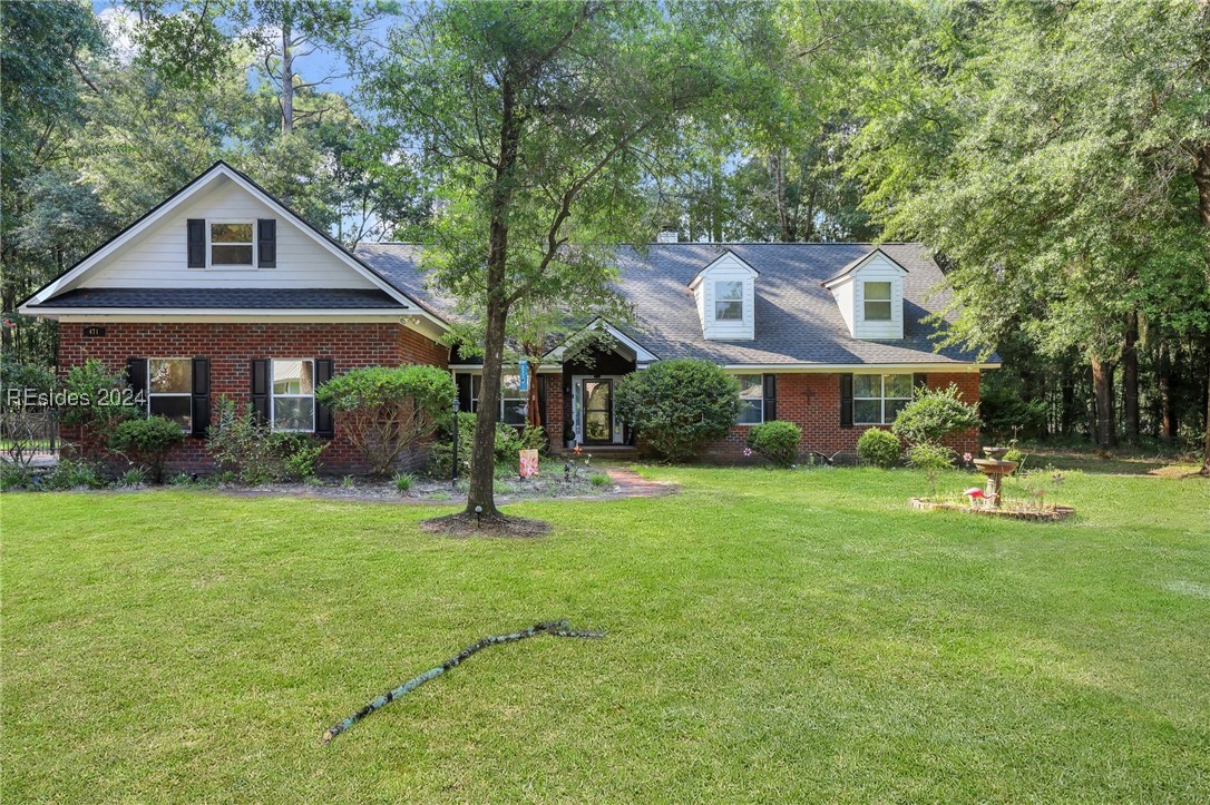 View of front of home with a front lawn