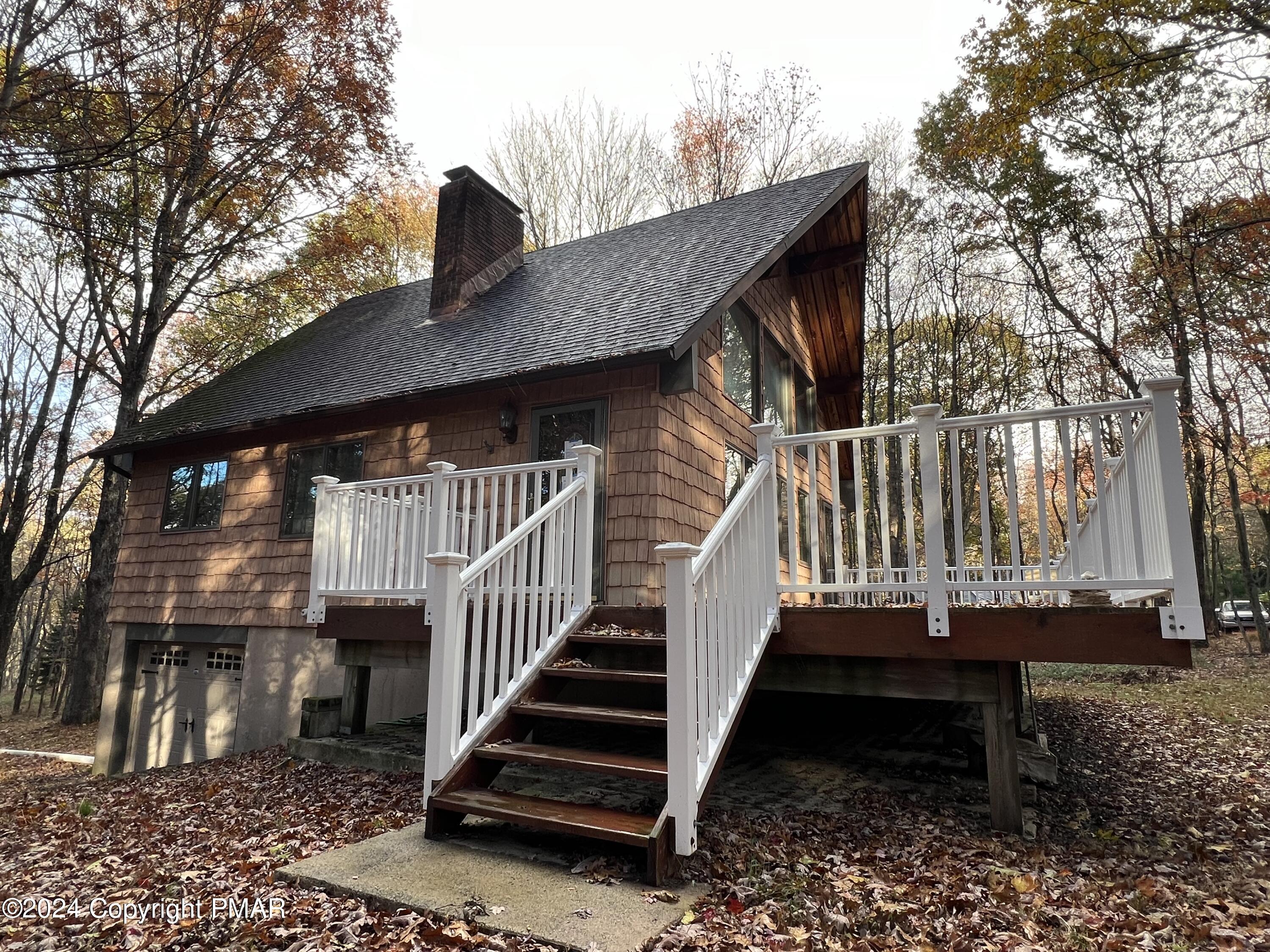 a view of outdoor space with deck and deck