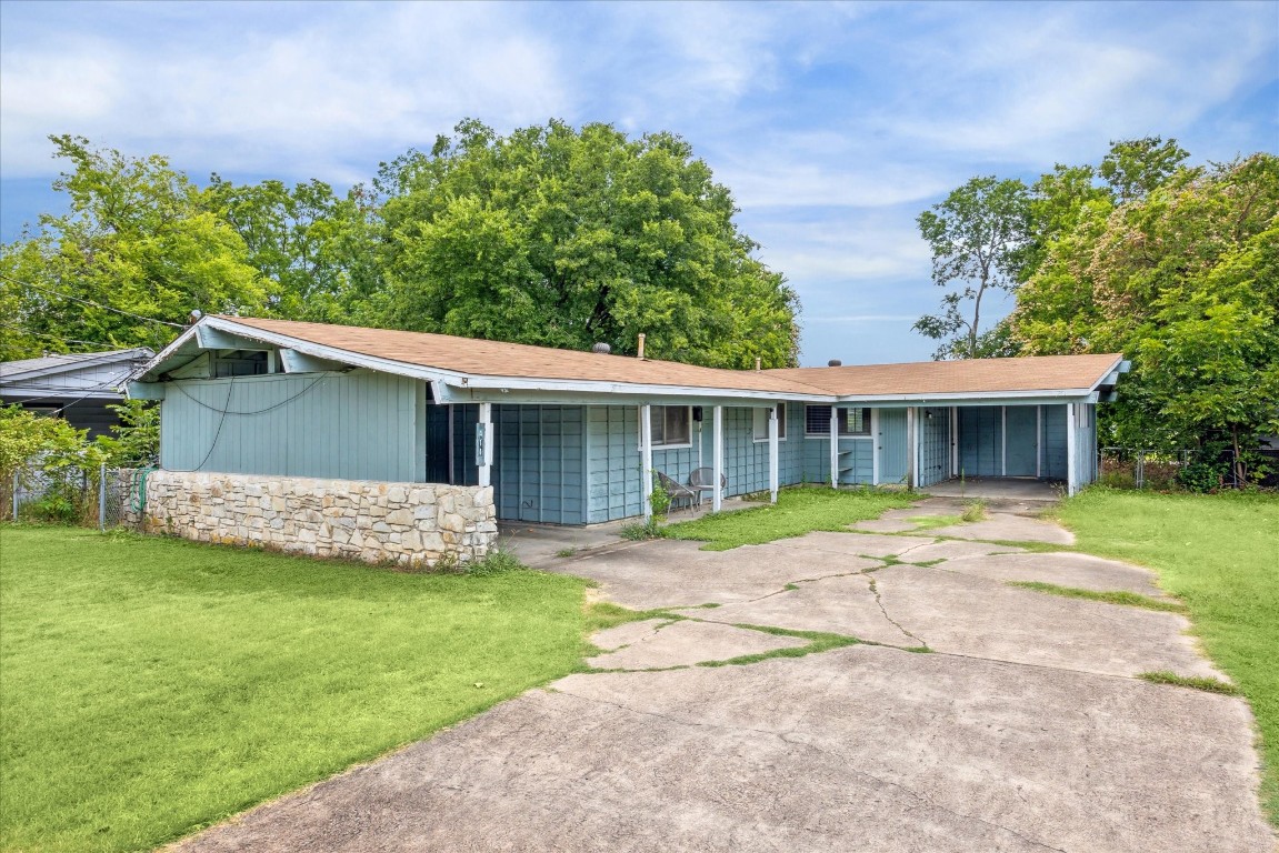 front view of a house with a yard