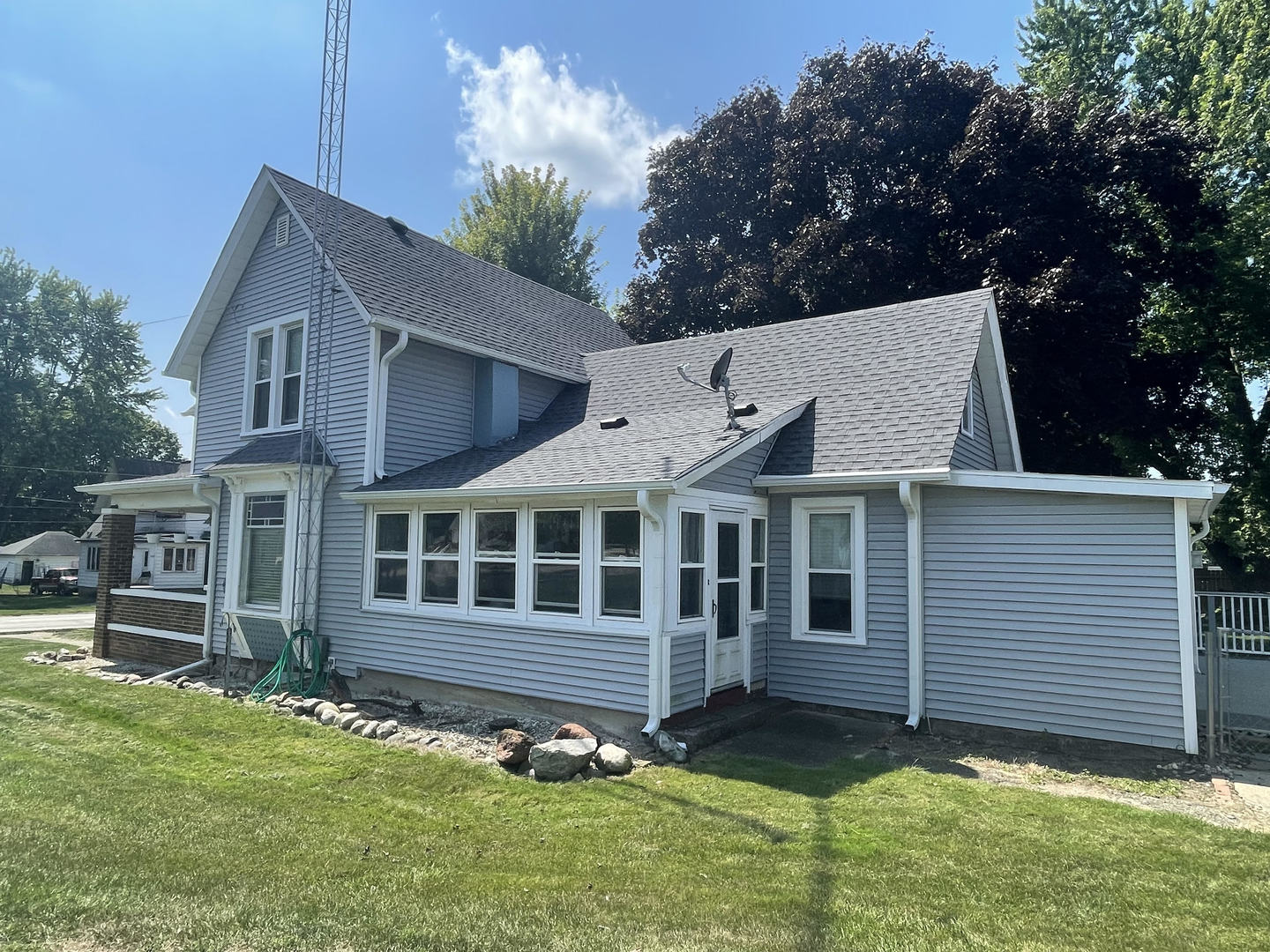 front view of a house with a yard