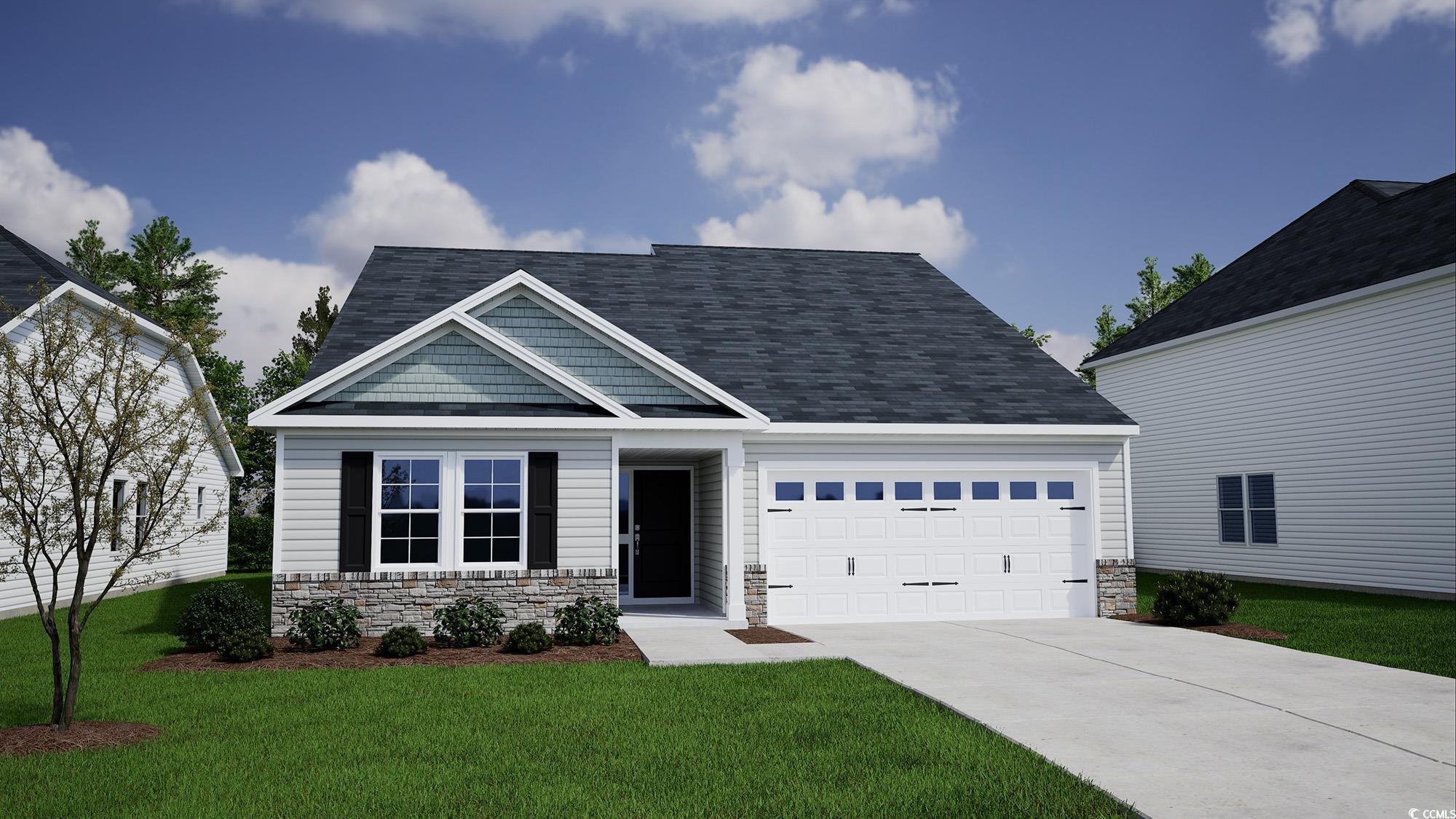 Craftsman-style house featuring a garage and a fro