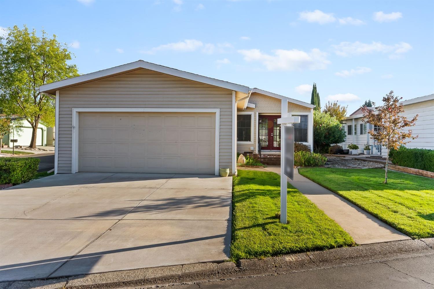 front view of house with a yard