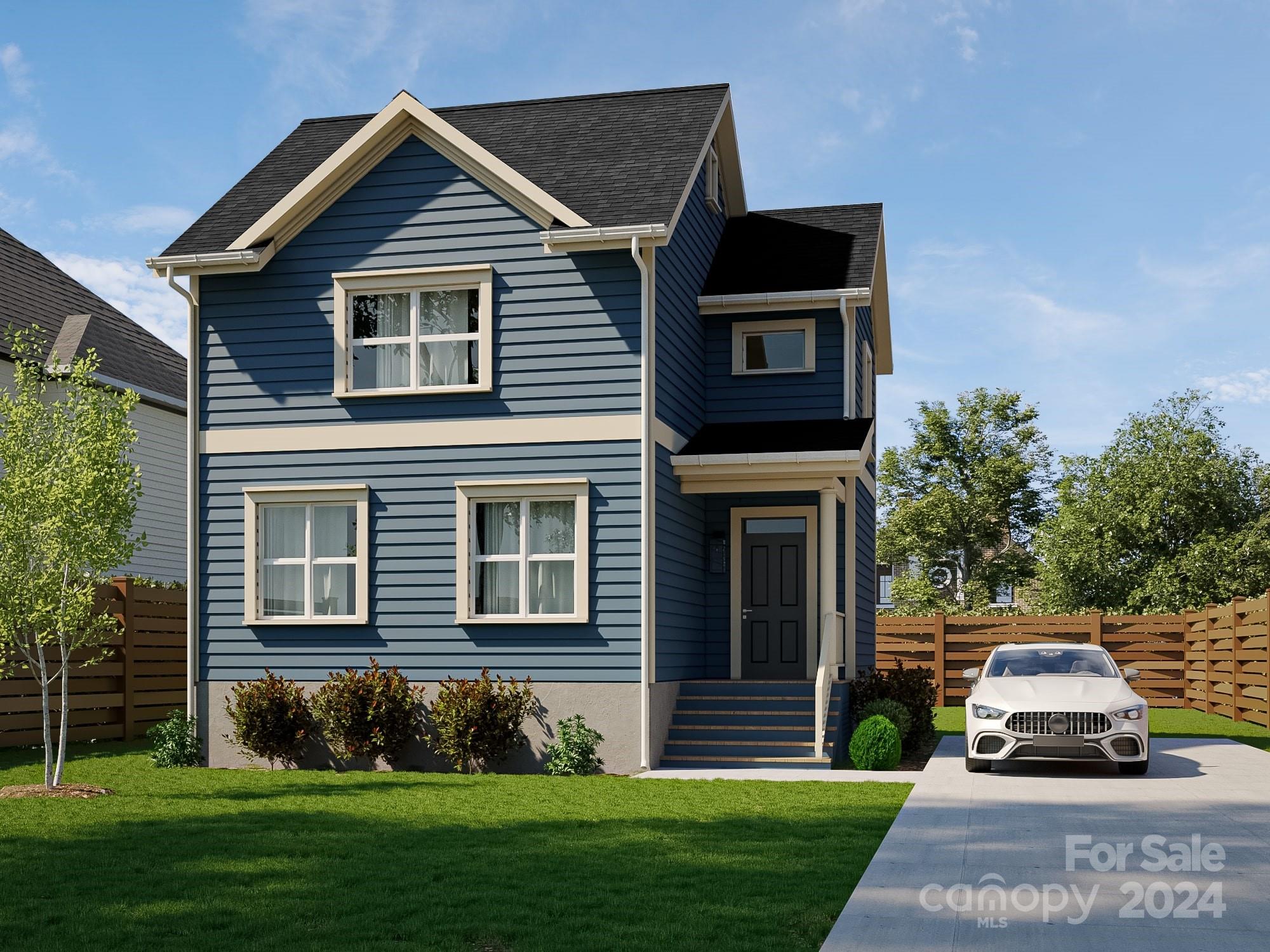 a car parked in front of a house with a yard