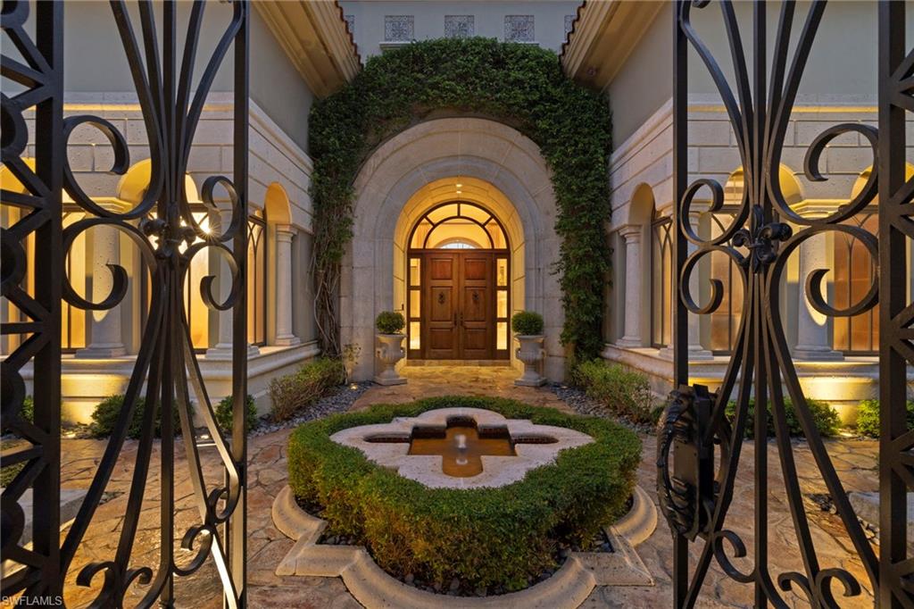 a view of an entryway with a fountain