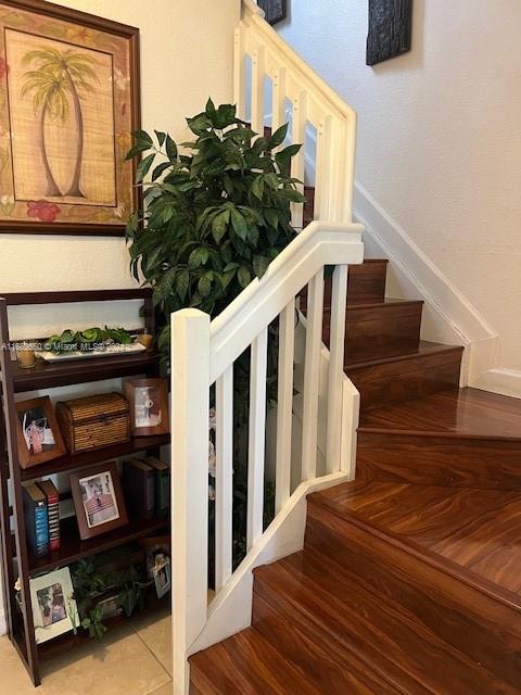 a view of entryway with wooden floor