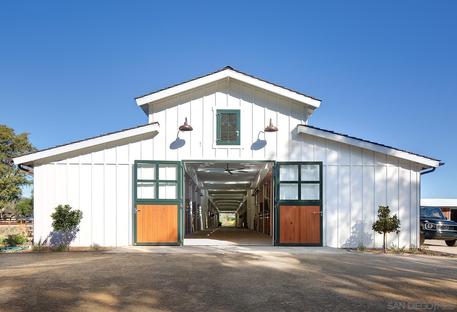 a front view of a house with a garage