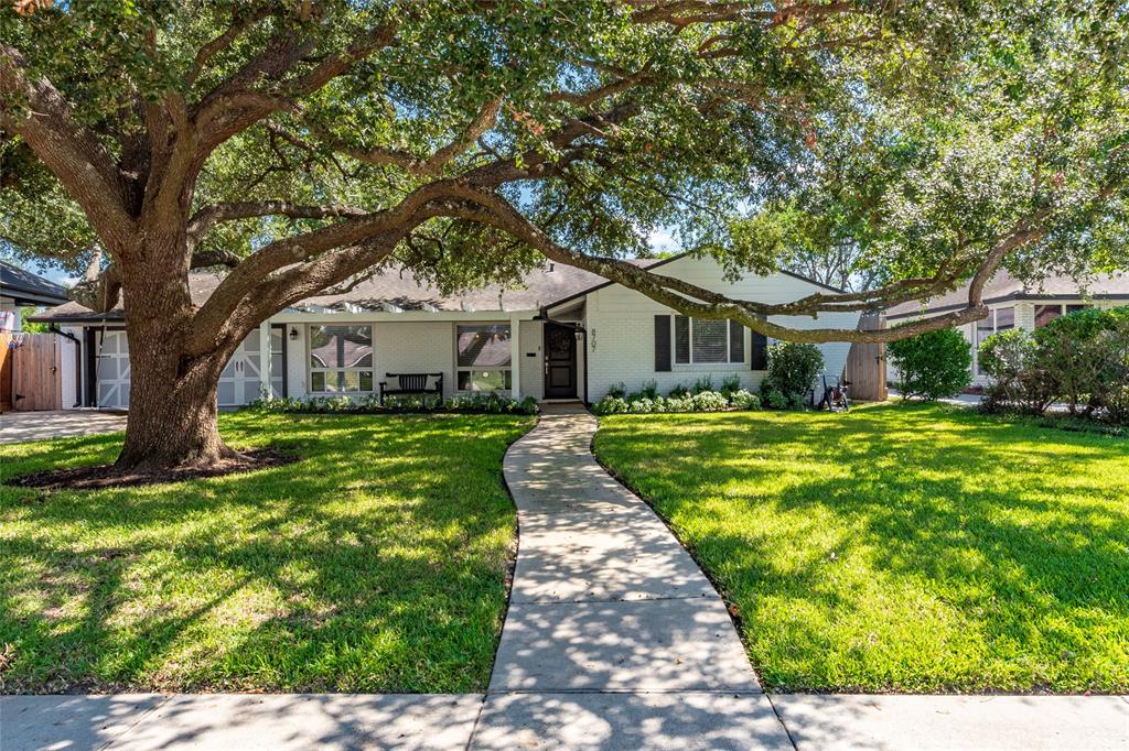 This home boasts an exceptionally beautiful Oak Tree in the front yard that shades the front of the homein the 2nd half of the day.