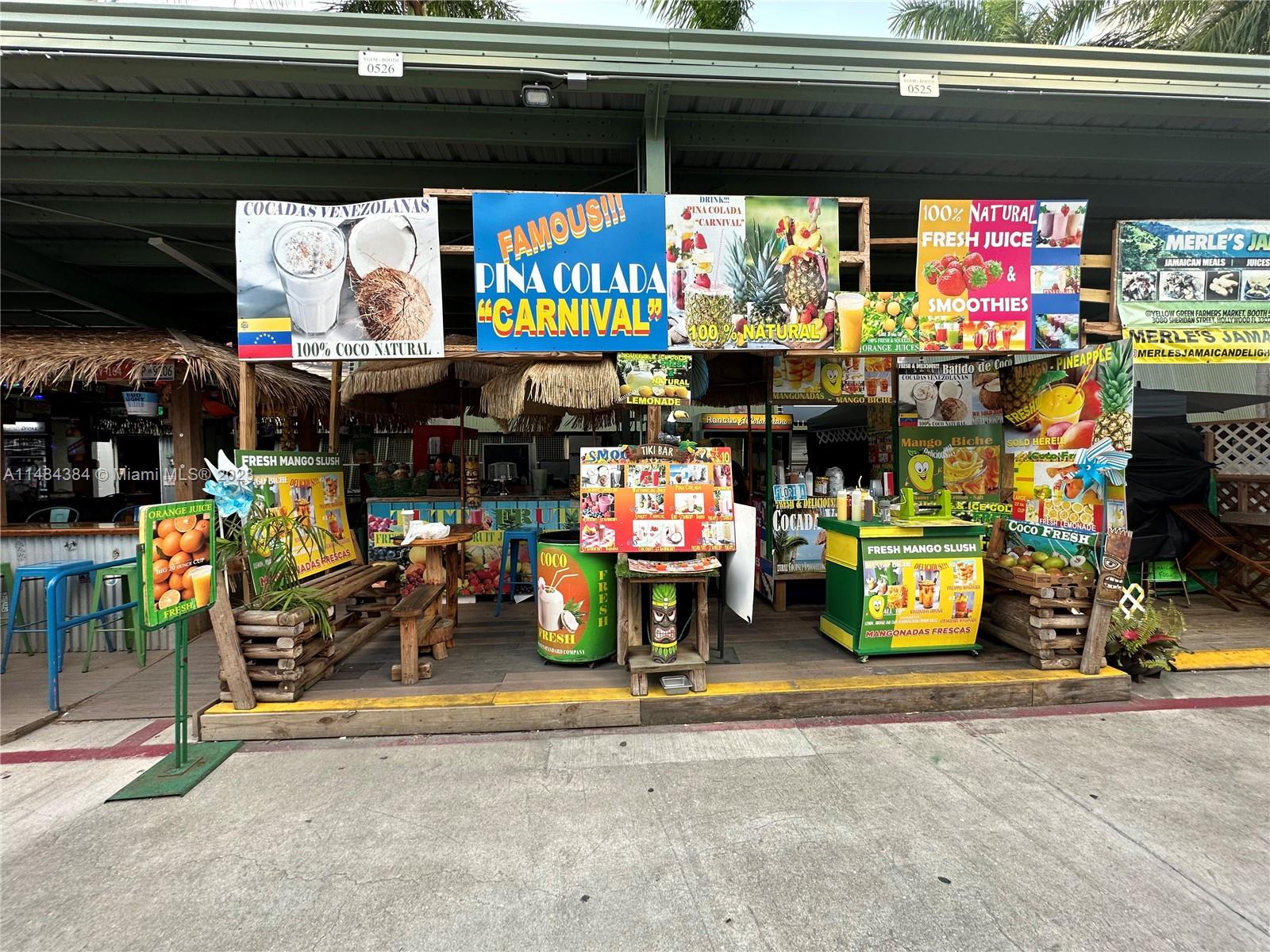 a store filled with lots of fruit and vegetables