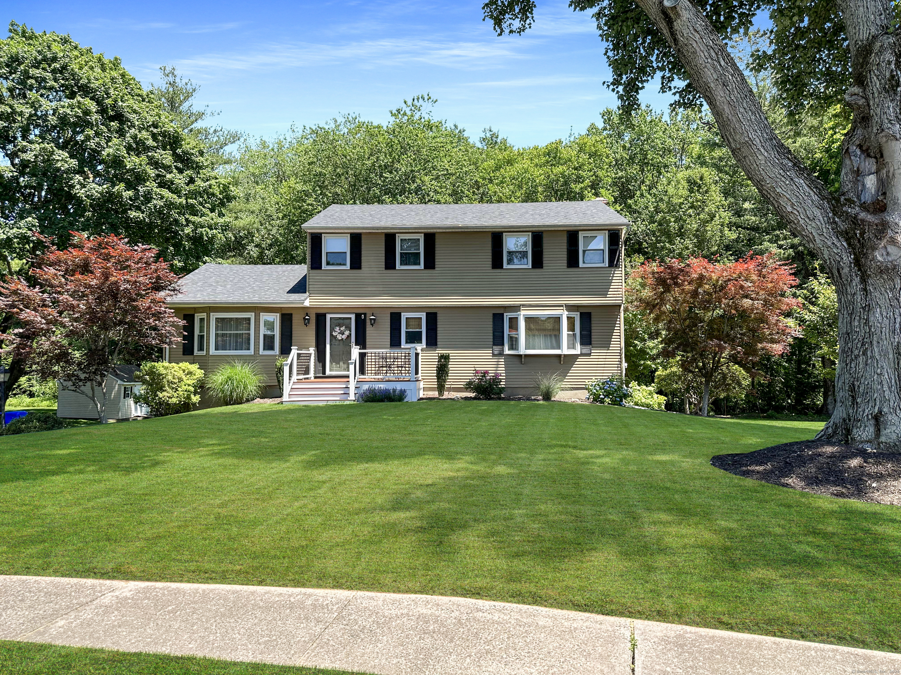 a house view with a garden space