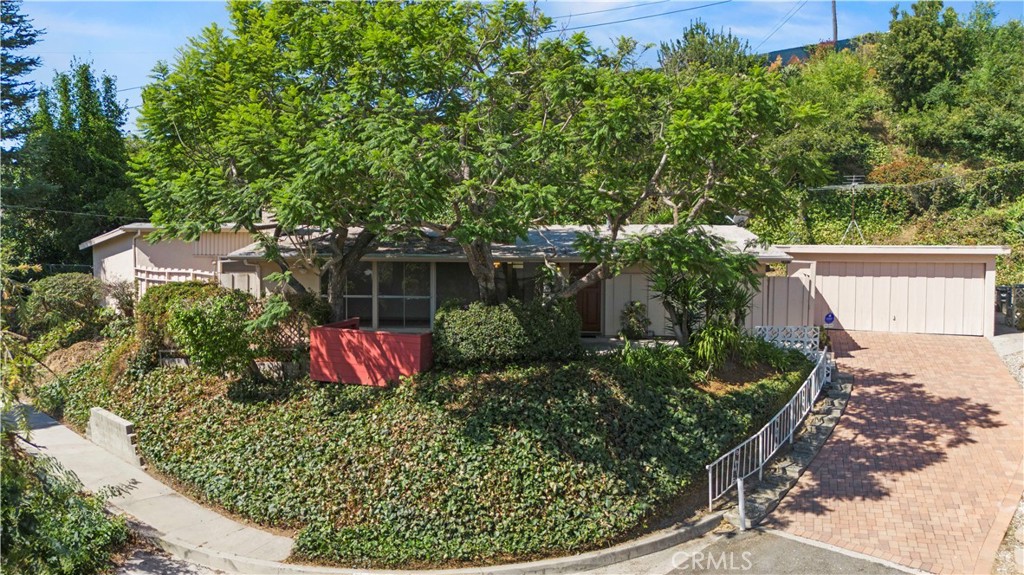 view of a house with a yard