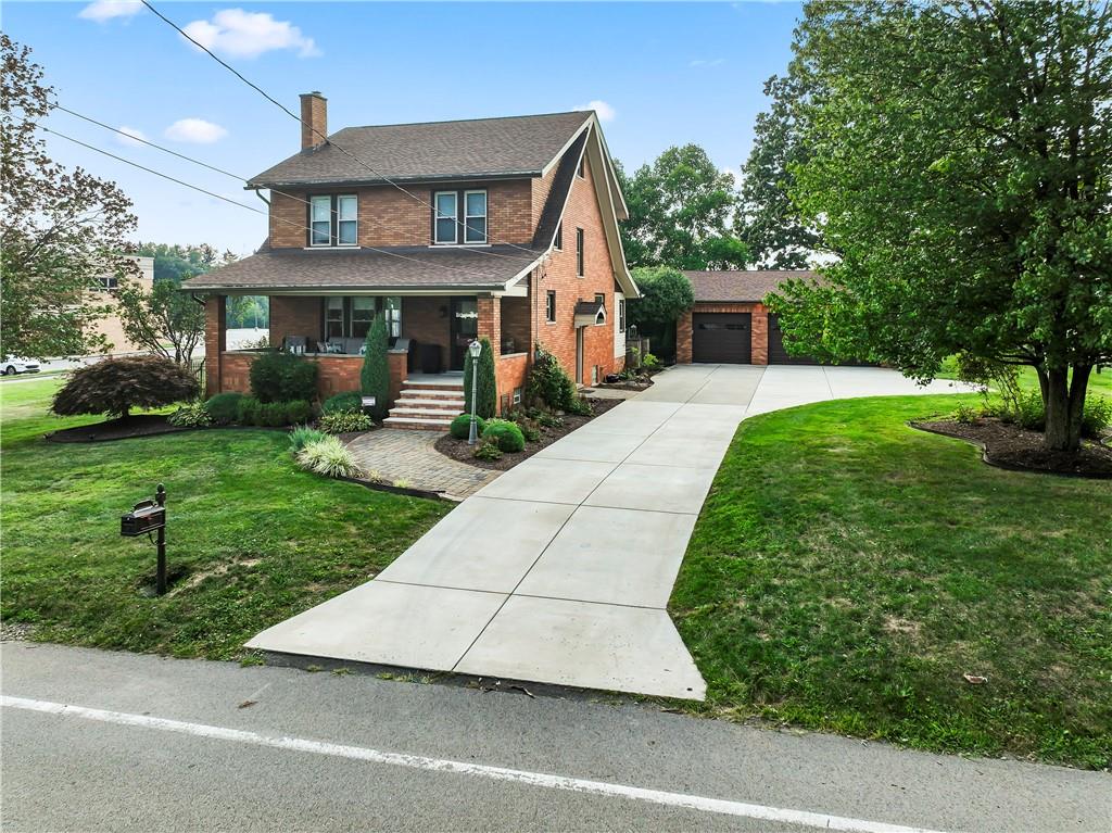 a front view of house with yard