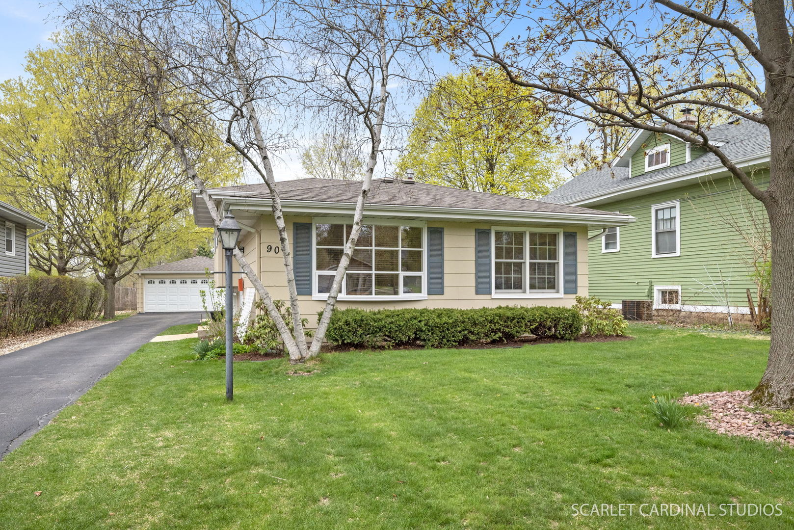 front view of a house with a yard