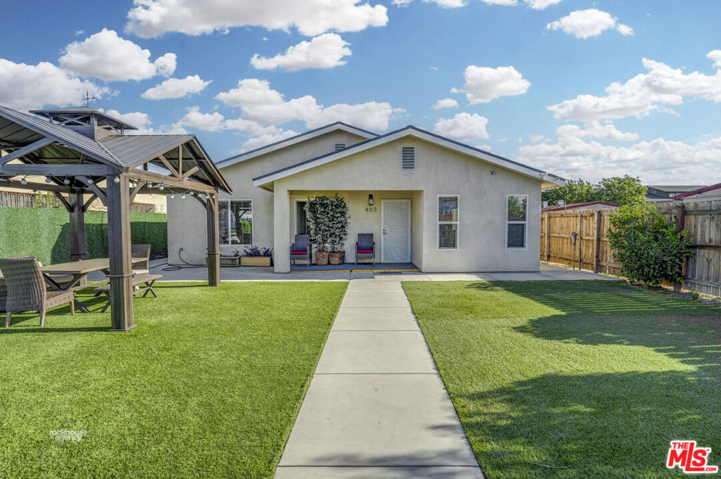 a view of outdoor space yard and front view of a house