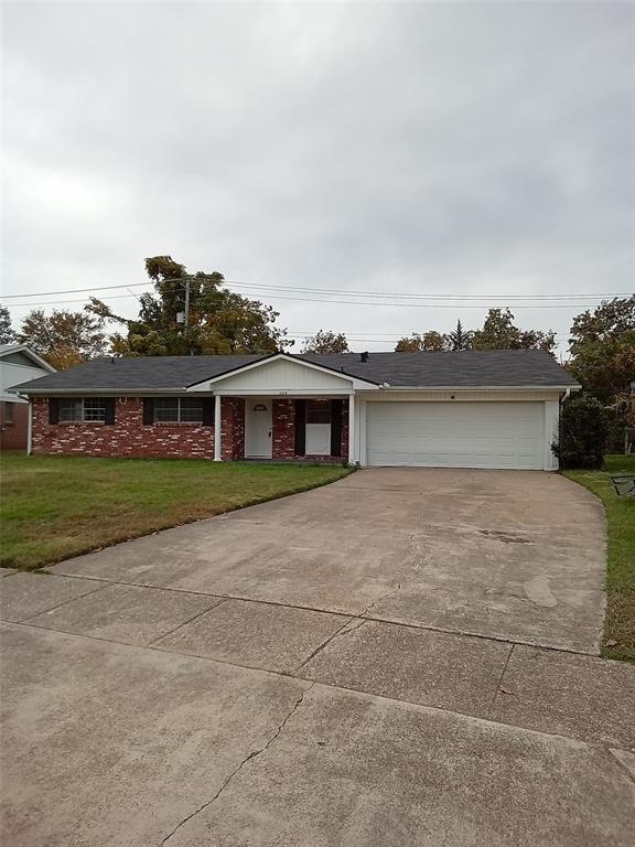 front view of house with a yard