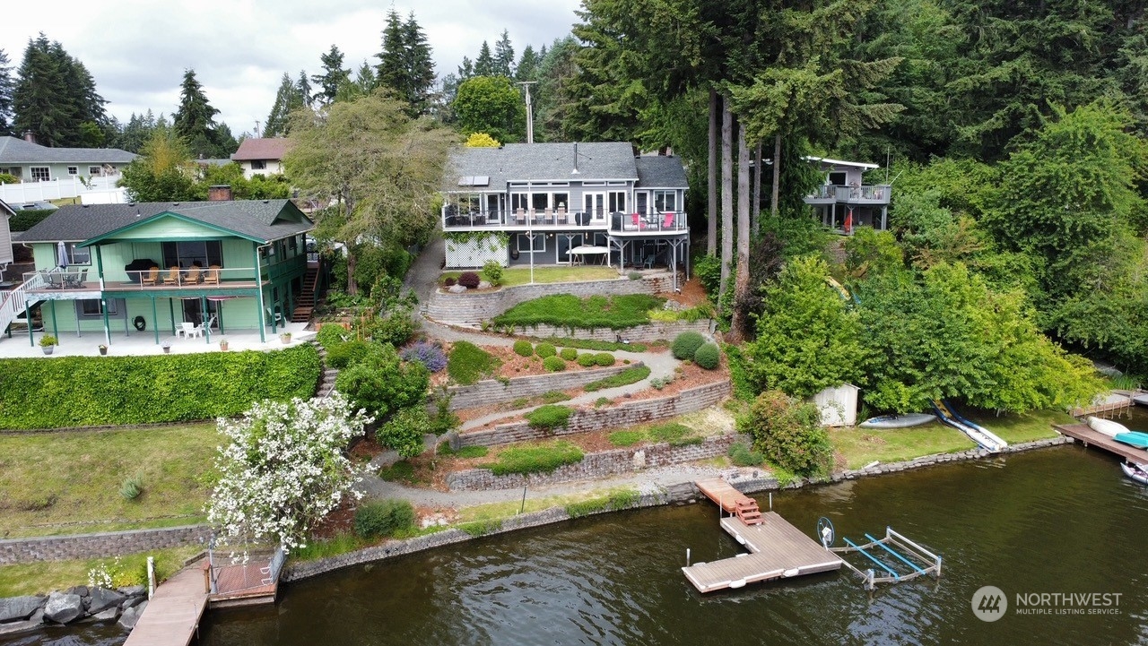 an aerial view of a house with a garden