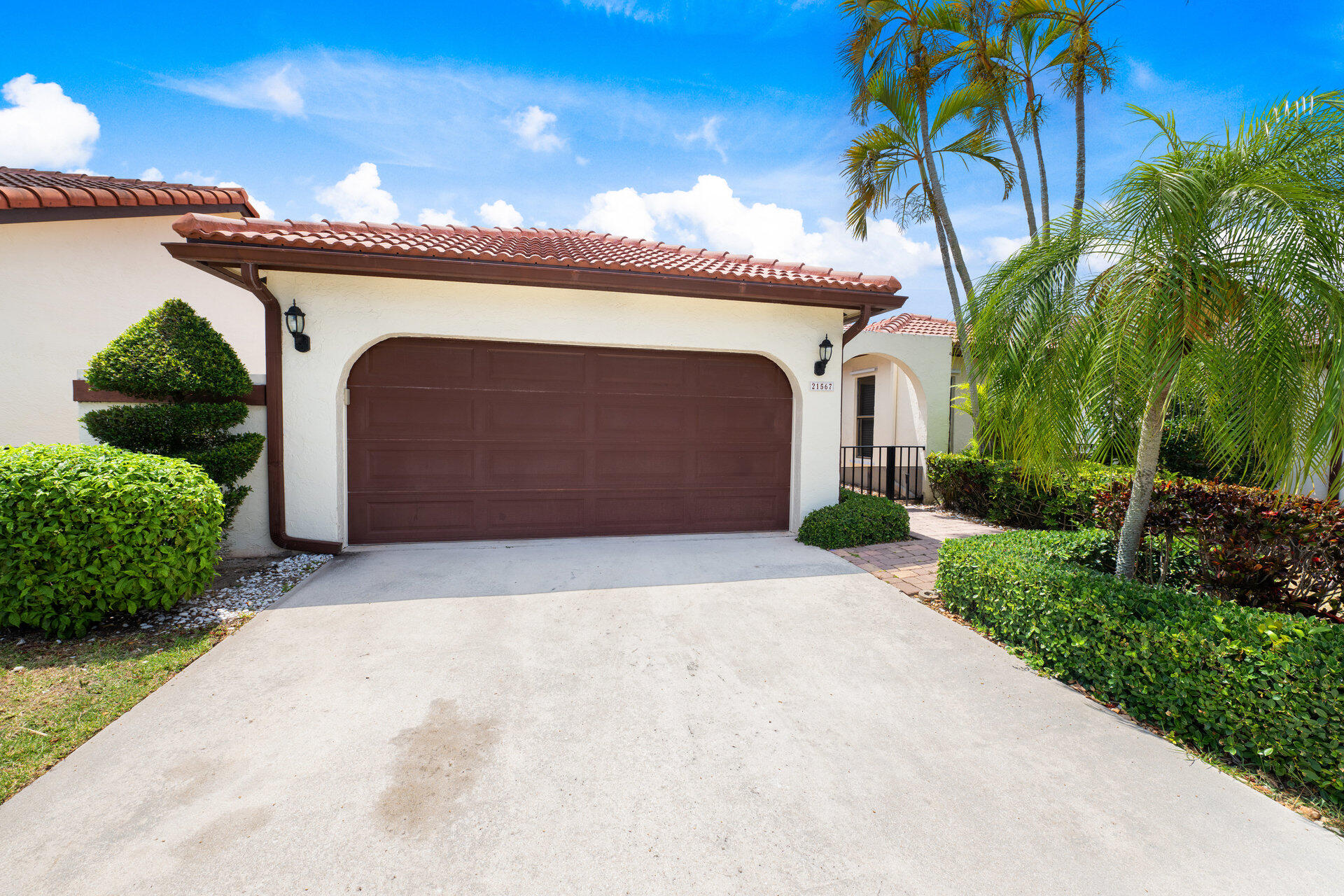 a front view of a house with a garage