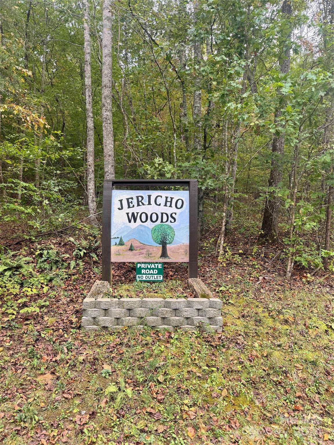 a sign on the side of a road