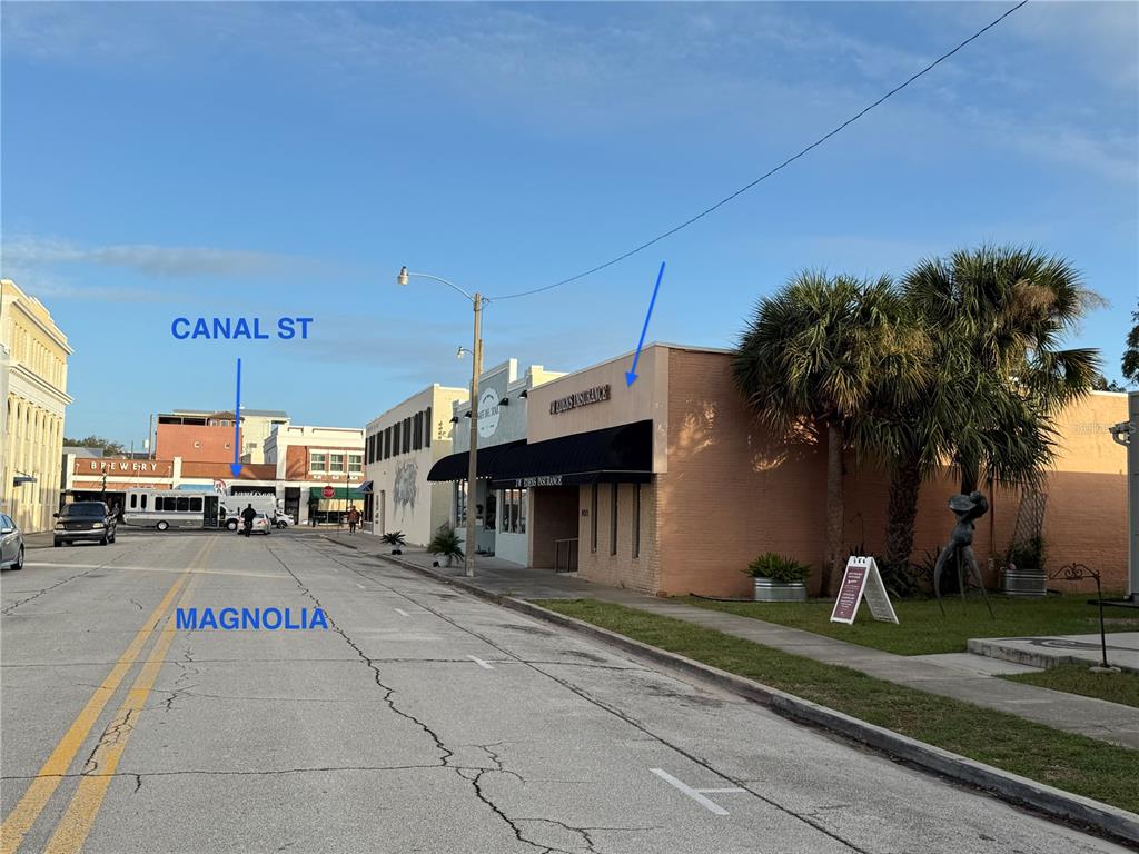 a view of a street with cars