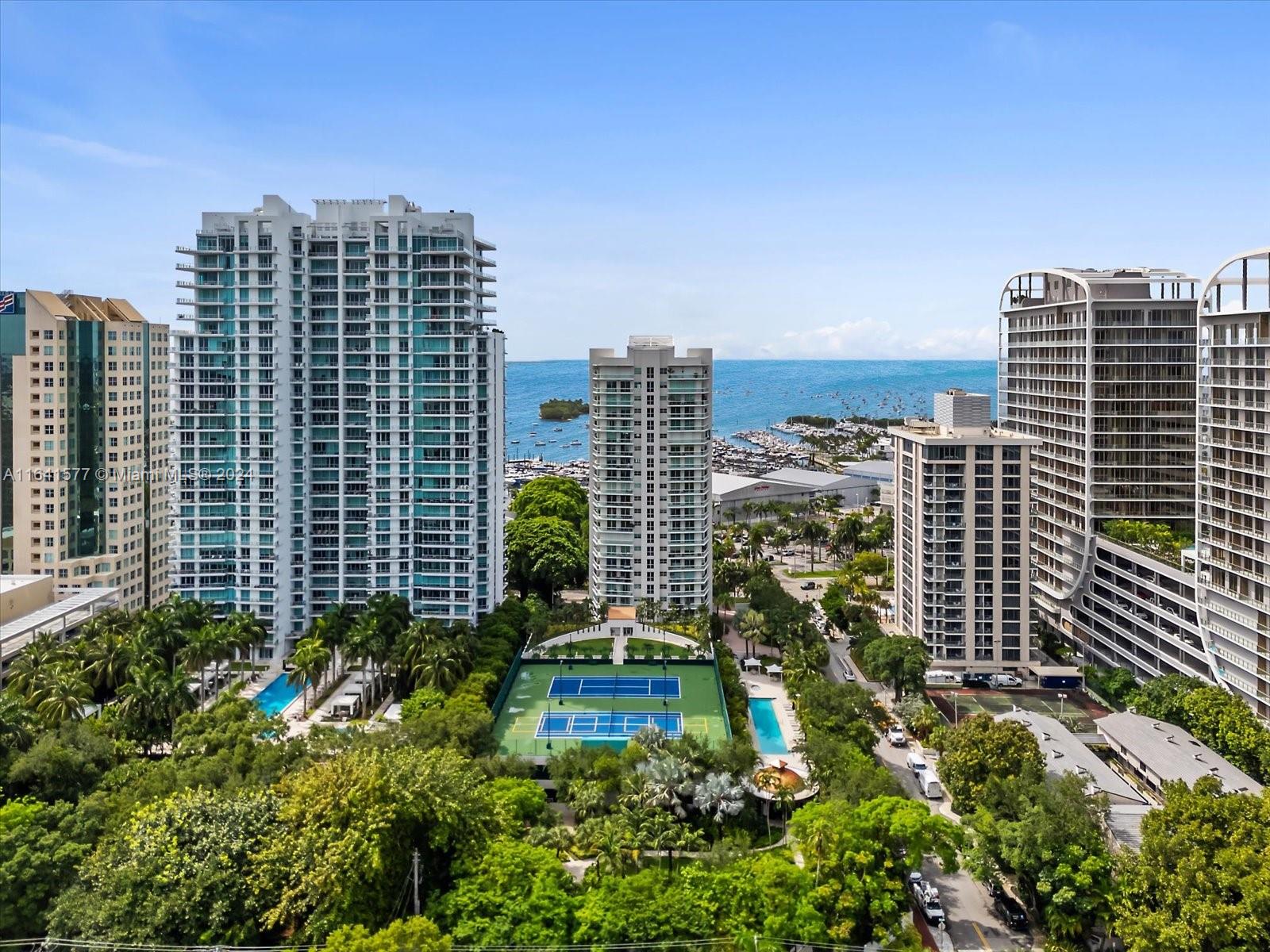 a view of a city with tall buildings