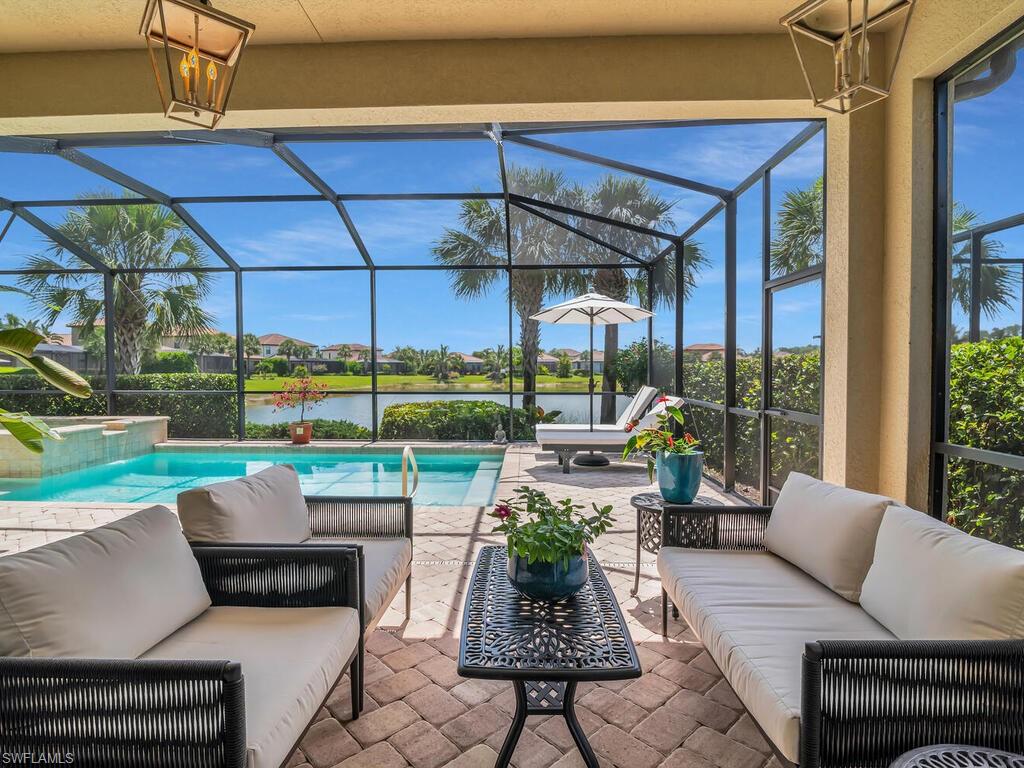 Patio sitting area featuring a water view