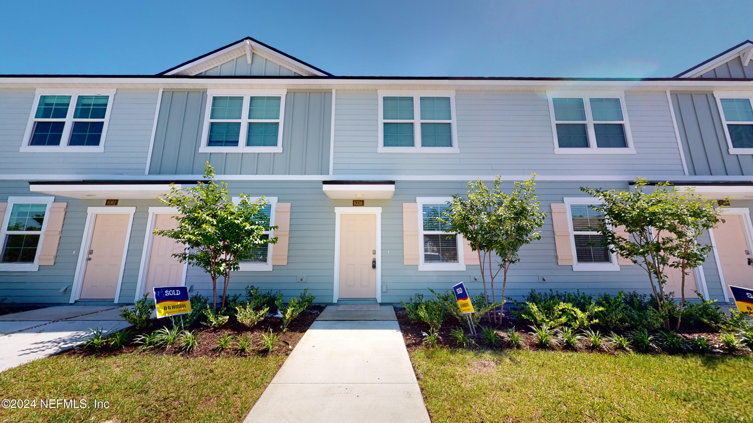 a front view of a house having yard