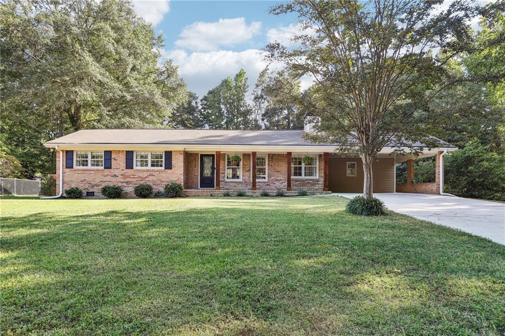 front view of a house with a yard