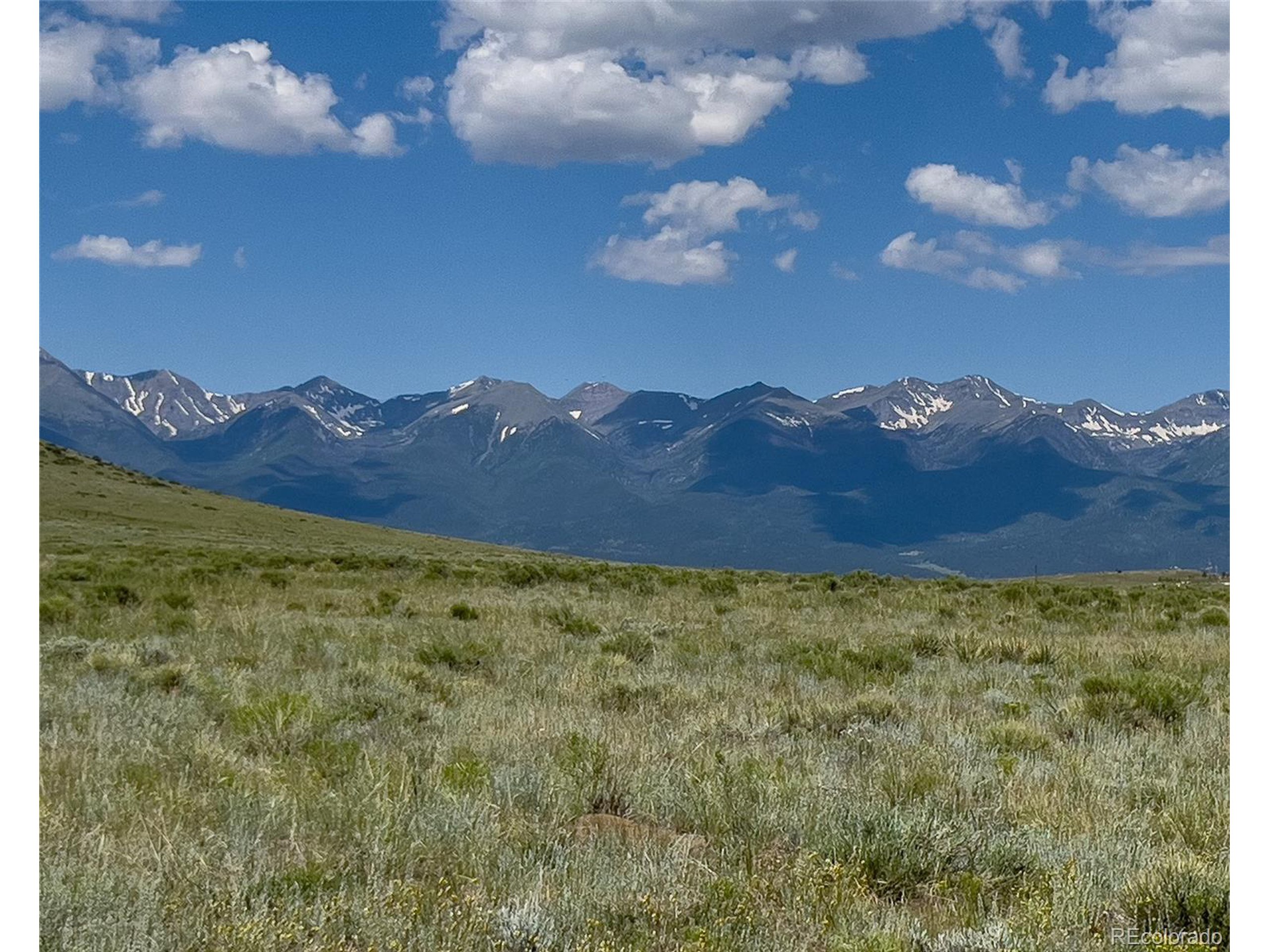 a view of an outdoor space and mountain view