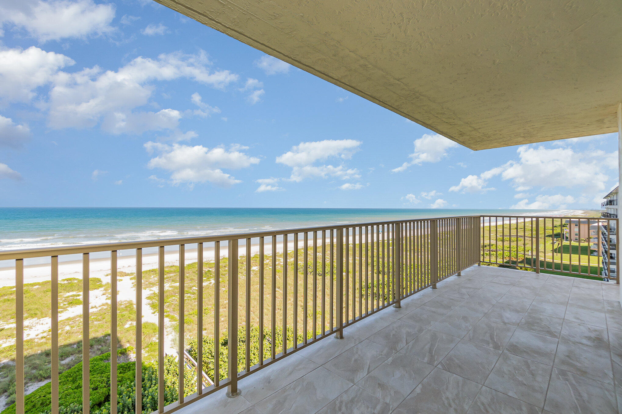 a view of balcony with ocean view