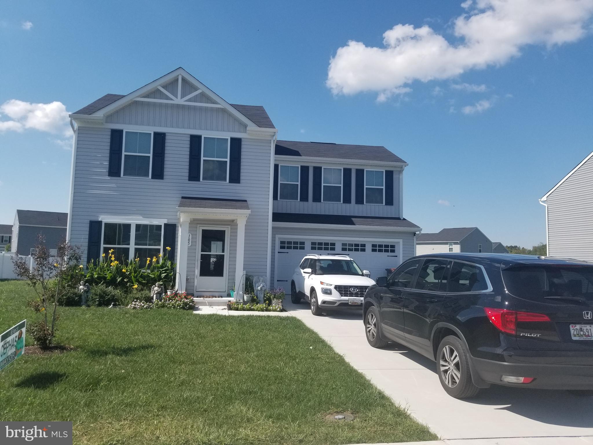 a car parked in front of a house