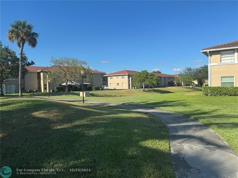 a view of a house with a big yard