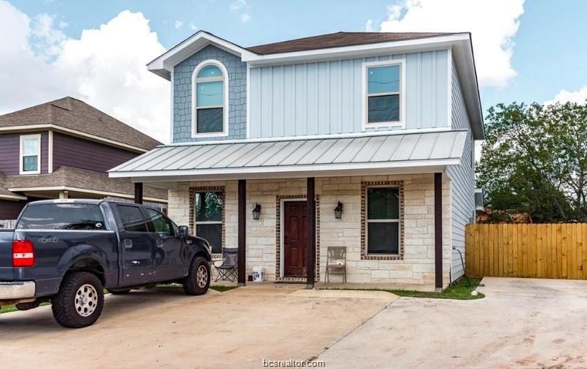 a car parked in front of a house