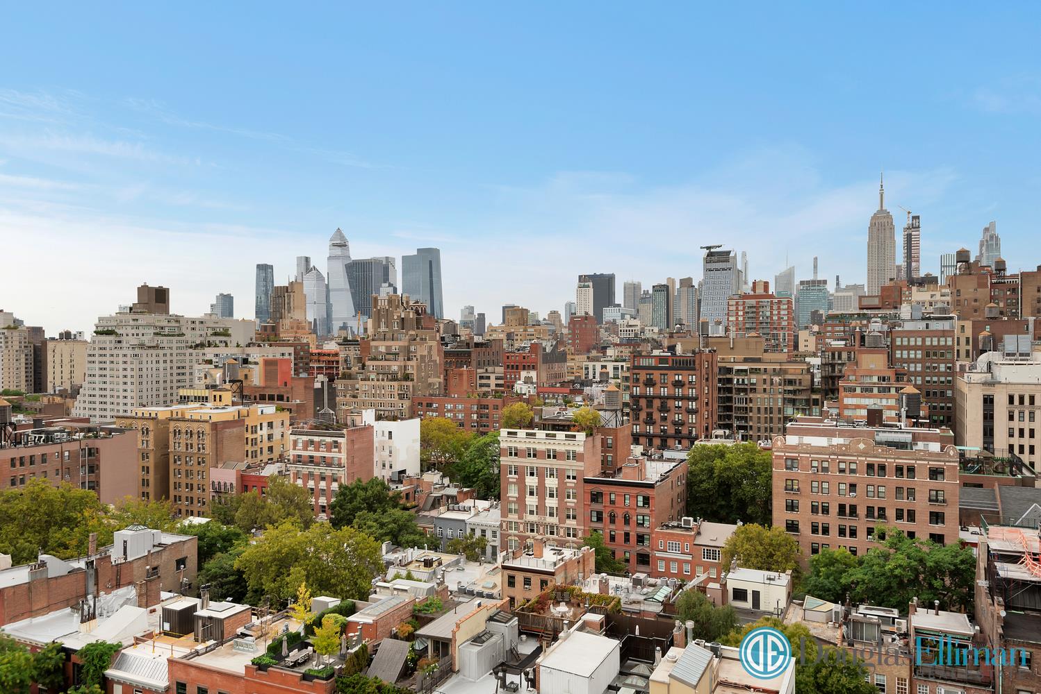 a view of a city with tall buildings