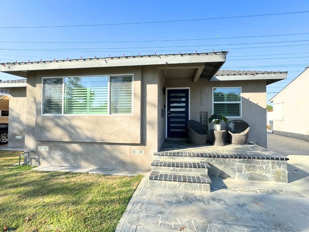 a view of a house with sitting area