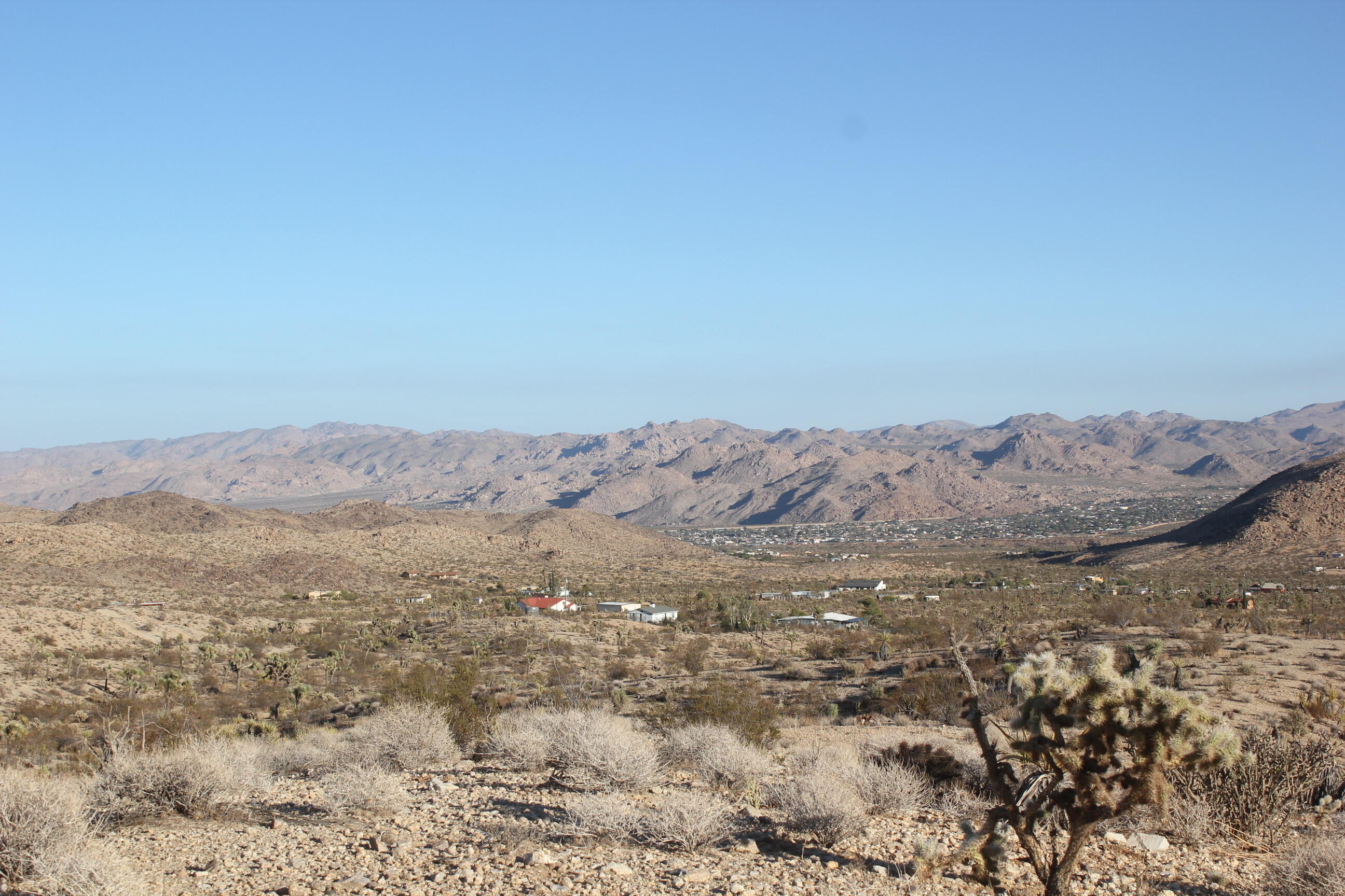 a view of mountains and valleys