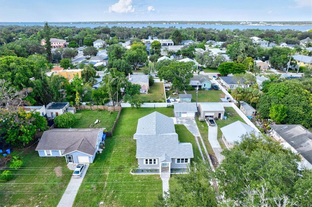 an aerial view of a house with a garden