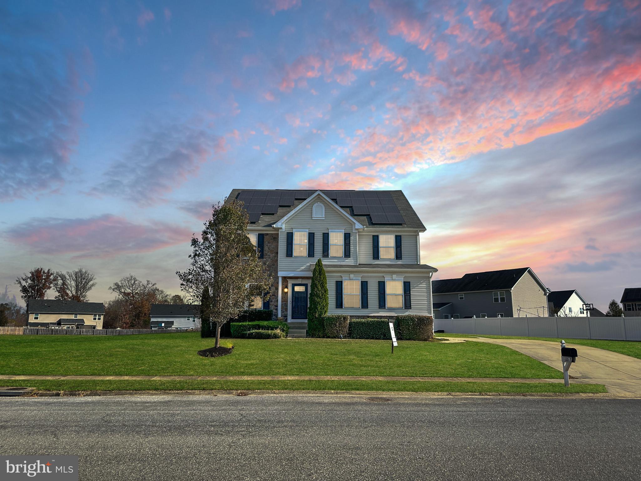 a house view with a garden space